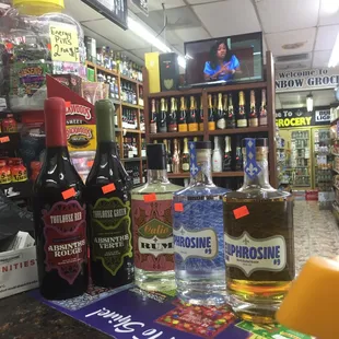 Calio rum,and New Orleans spirits(atelier vie) gin, and barrel finished reserve gin, rouge and green absinthe... and more