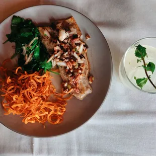 Rainbow trout with lump crab meat, sweet potato curls, spinach.    Drink: Streamer