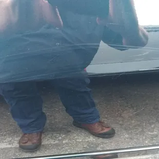 the reflection of a man in a mirror