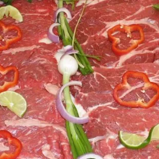 a variety of raw meats