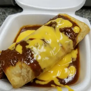 Burrito topped with chilli cheese