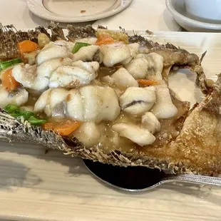 Whole deboned flounder served on crispy fish