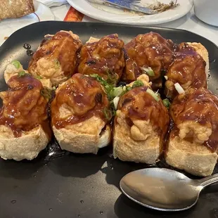 Pan fried tofu stuffed with shrimp paste in black bean sauce $18