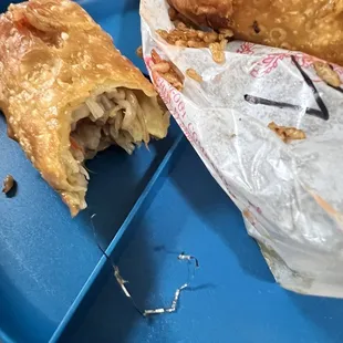 Metal removed from my mouth after taking a bite of vegetarian egg roll.