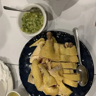 Traditional steamed chicken and ginger sauce