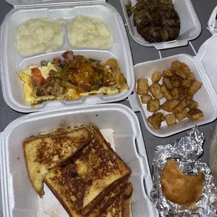 Breakfast, &quot;veggie omelette with ham and cheese added&quot;, French toast, biscuit, grits, potatoes, hamburger steak