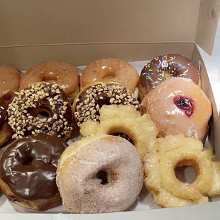 The best Sunday morning! One dozen of donuts and a free hazelnut iced coffee! Thank you Rainbow Donuts