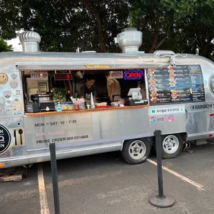 a food truck parked in a parking lot