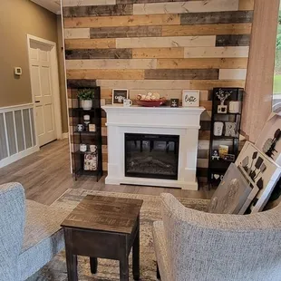 a living room with a fireplace