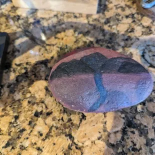 I wansnt sure if this was an art piece or a kindness rock, so I took a photo and left it behind