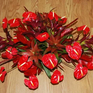 Our tropical funeral sprays are unique and different. Always eye-catching and unusual.