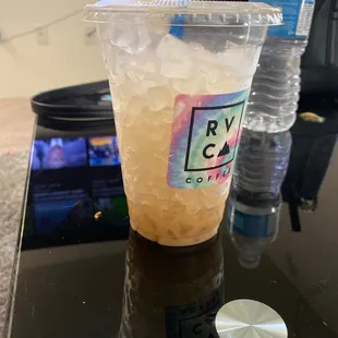 a cold beverage in a plastic cup