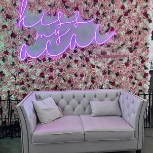Photo Opportunity. Cute couch with cute &quot;Kiss My Açaí&quot; sign.