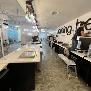 a man working on a laptop in an office