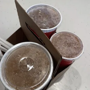 three cups of iced coffee