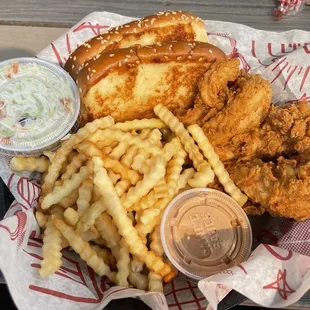 3pc chicken tender combo with extra toast, a side of coleslaw and their signature dipping sauce.