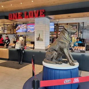 a dog statue in a mall