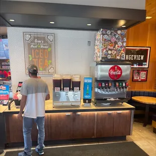 a man standing at a counter