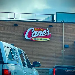 cars parked in front of a building