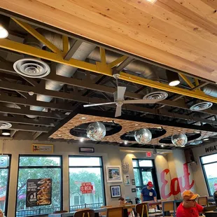Dining area with DISCO BALLS?!