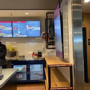 a man standing in a kitchen