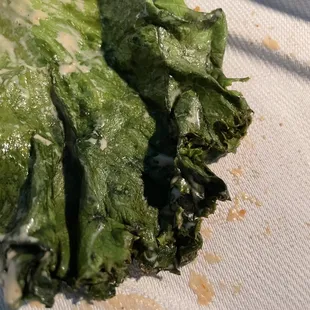 Wilted lettuce with brown edges not appealing.