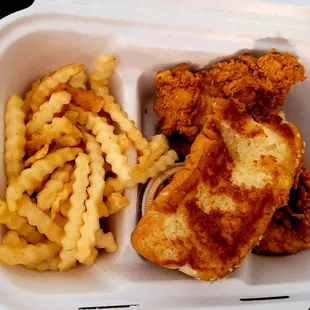 a meal in a styrofoam container