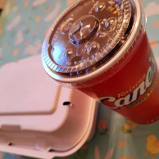 a drink in a plastic cup