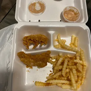 a meal in a styrofoam container