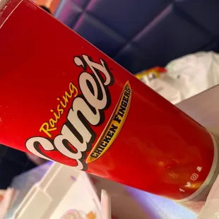 a drink in a paper cup