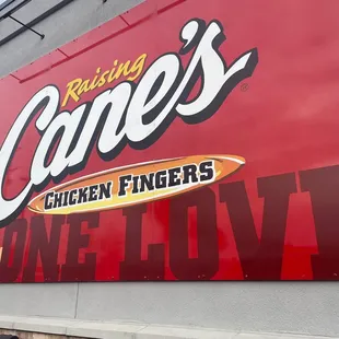 a large sign on the side of a building