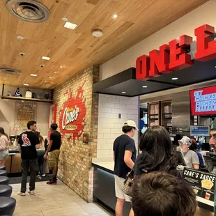 At the counter about to order