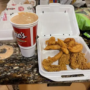 Chicken and extra sauce. A whole large drink cup Full Of  Sauce!!!!