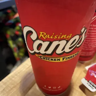 a red cup with a straw