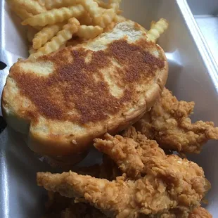 Chicken tenders, fries, &amp; toast.