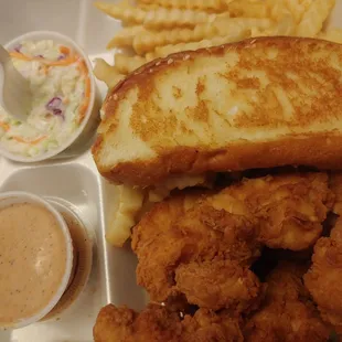 Chicken strips- 6- toast- French fries- cole slaw- 2 sauces and a large drink. So So good.