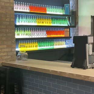 Decorative wall of soda bottles