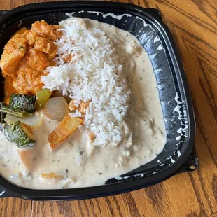 Bowl 2 with chicken, korma, and basmati rice. Comes with sautéed veggies.