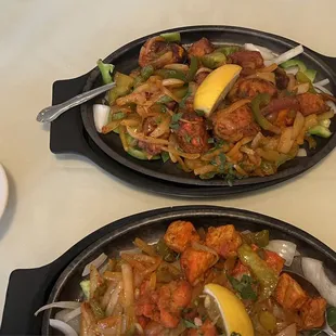 two pans of food on a table