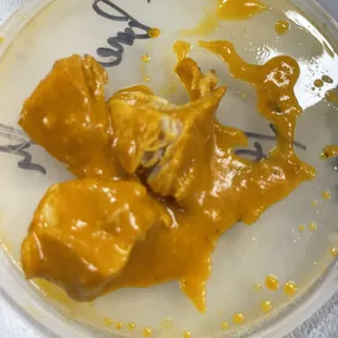 a plate of food with sauce on it