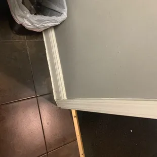 Excellent, the trash was position next to the door, grab handle with paper towel and then toss it in the trash