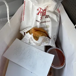 a sandwich in a paper bag