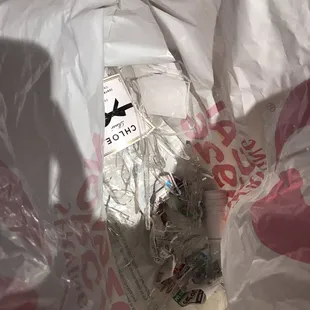 a bottle of liquor wrapped in plastic
