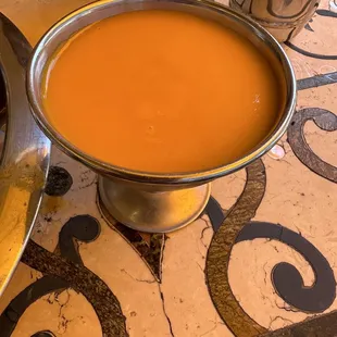a bowl of soup on a table