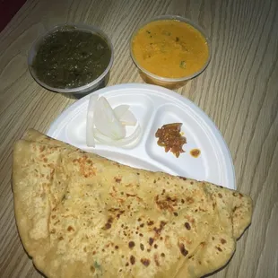 Aloo paratha, Butter Chicken, and saag
