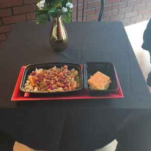 two trays of food on a table