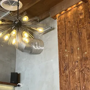 a modern light fixture in the kitchen