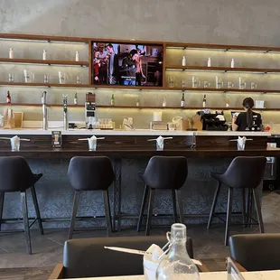 a bar with a television in the background