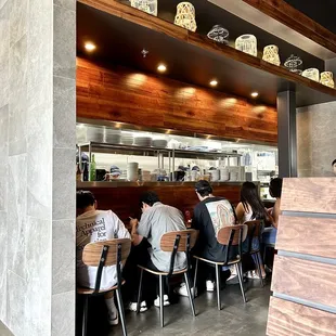 people sitting at the counter
