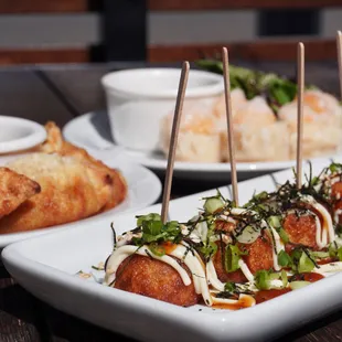 Dine on some delicious appetizers such as Takoyaki, Pork Gyoza, and Shrimp Shumai!